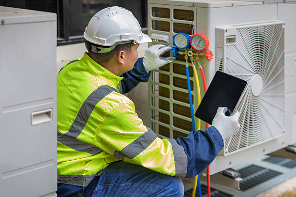 Professional Heat Pump Repair technician working in Carbon, TX